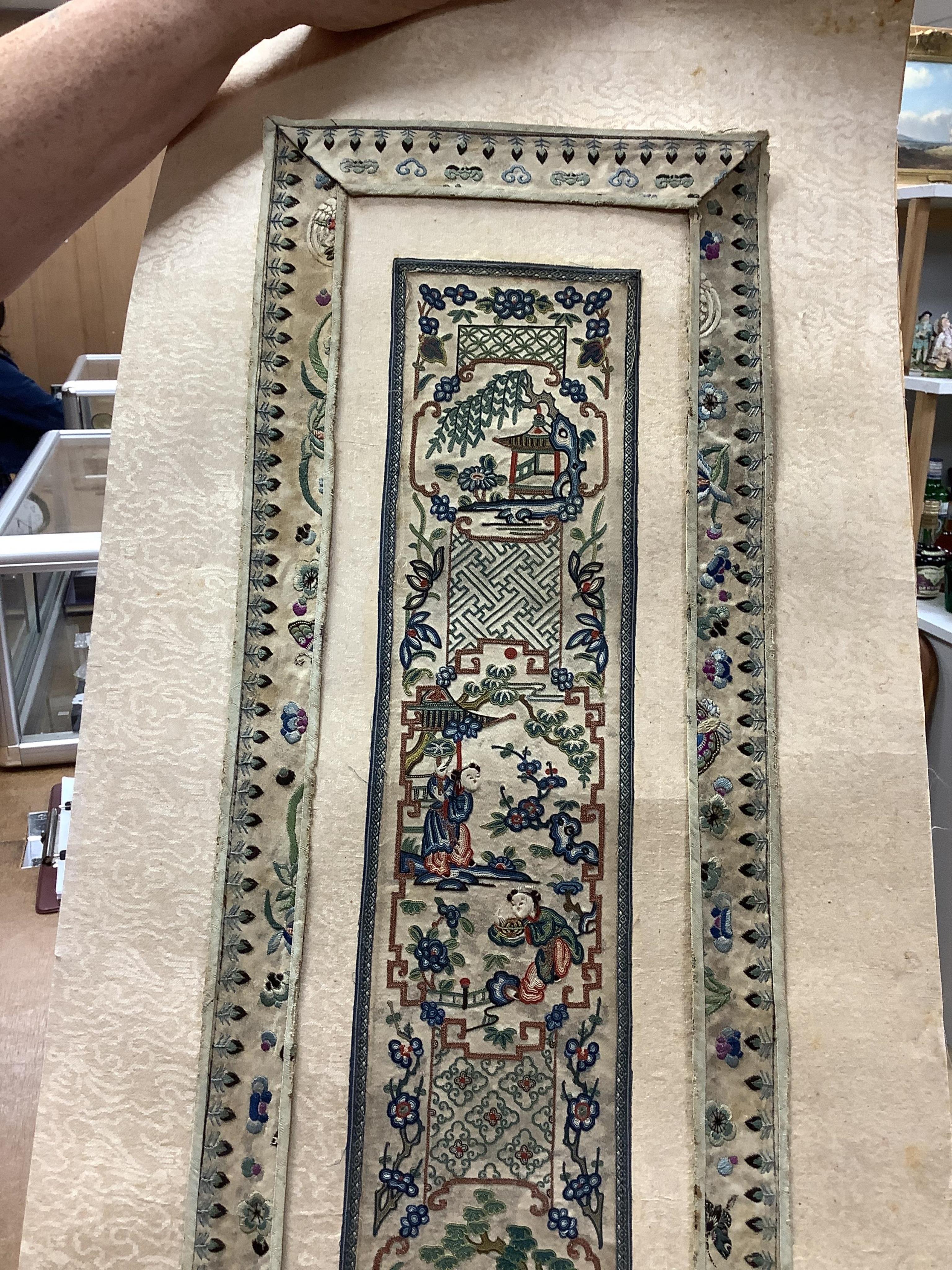 A pair of Chinese silk embroideries, in scroll form